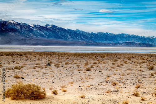 Bild auf Leinwand Owens Valley, California, with view of Owens Lake and snowcapped Eastern Sierra