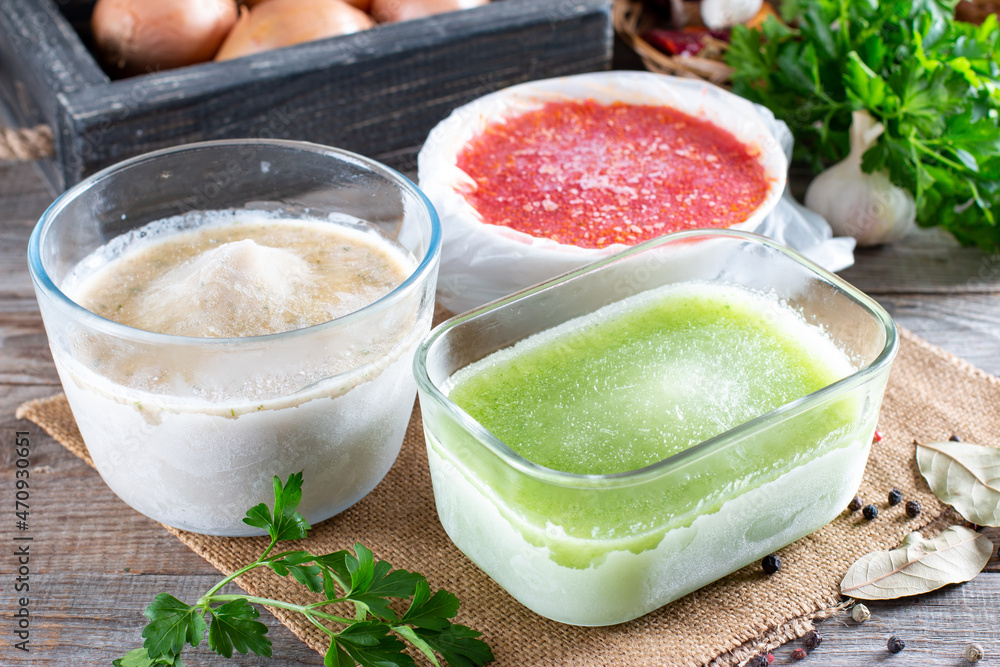 Frozen soup in a container. Frozen food Frozen soup in a container. Frozen food