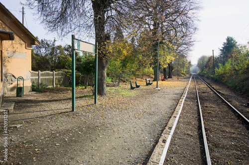 Old railways in autumn at a small train stop