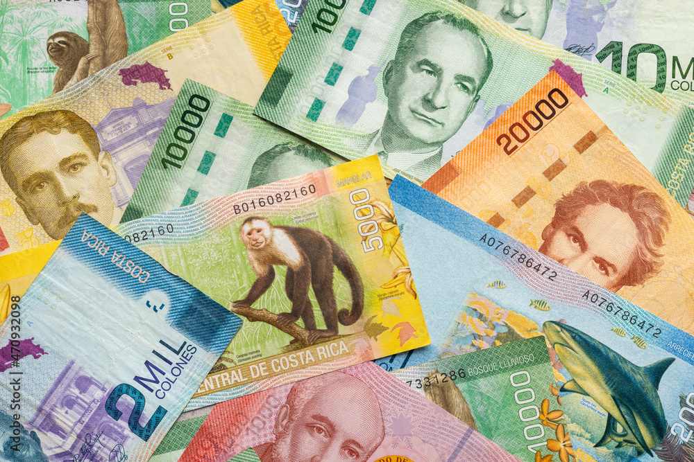 Costa Rica currency all banknotes scattered on the table, filled frame Costa Rica currency all banknotes scattered on the table, filled frame