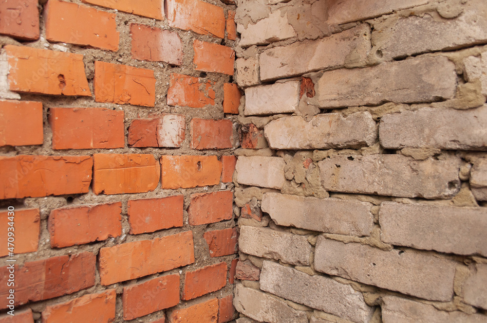 Fototapeta premium two walls of red and white brick solid background