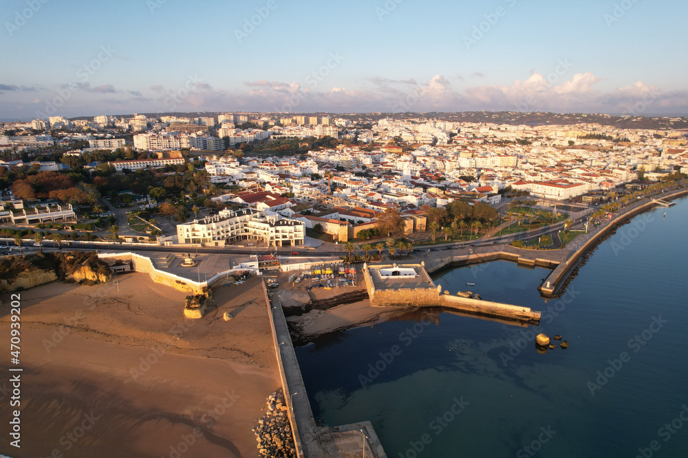 Obraz premium Aerial from the city Lagos in the Algarve Portugal at sunrise marina harbor