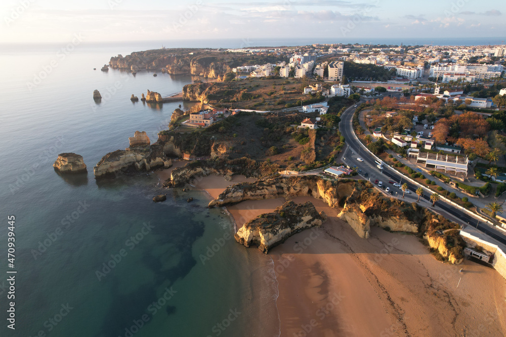 Aerial from the city Lagos in the Algarve Portugal at sunrise marina harbor