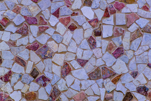 Canvas Print A colorful mosaic of small irregular stones, texture