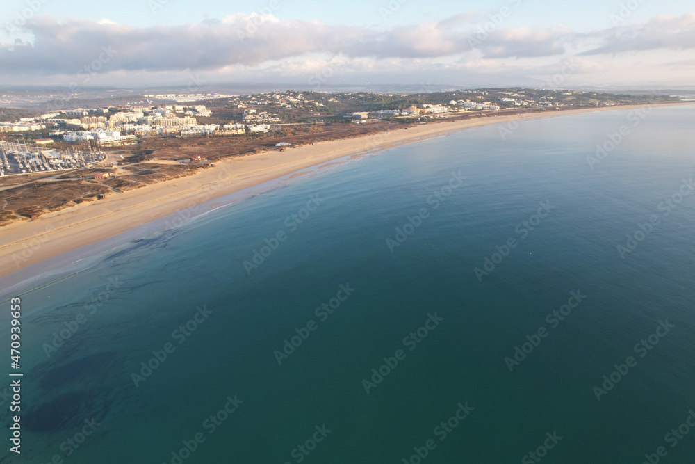 Aerial from the city Lagos in the Algarve Portugal at sunrise marina harbor