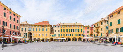 Finale Ligure. May 21, 2021. Panoramic view of Piazza Vittorio Emanuele II and the its historic buildings in the Finale Marina district.