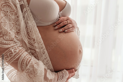 woman holding belly