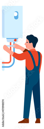 Man repair hot water pipes. Handyman fixing boiler