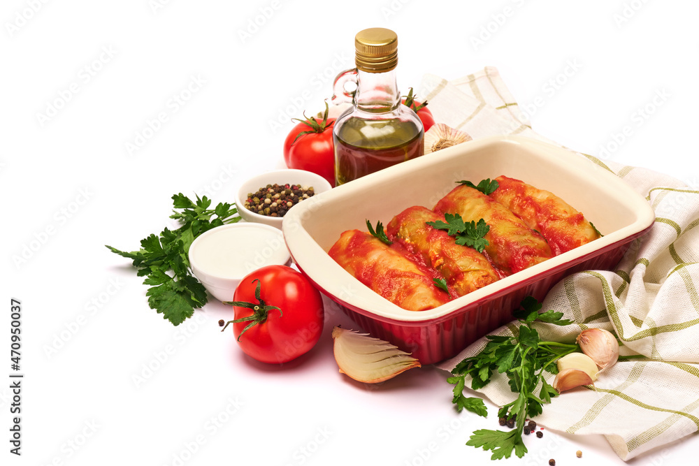 cabbage rolls stuffed with ground beef and rice with sour cream in a baking dish and ingredients cabbage rolls stuffed with ground beef and rice with sour cream in a baking dish and ingredients