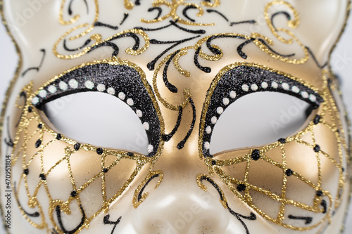 Paris, France - 11 22 2021: Packshot of Masked woman. A colorful cat mask with glitters