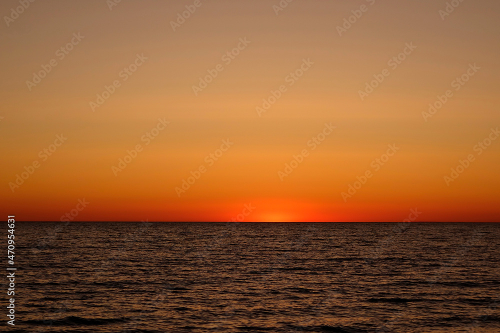 Colorful sunset at sea for a magazine, banner, advertisement or desktop
