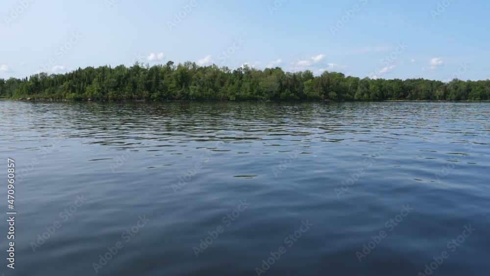 Slow motion cruising on Lake Nipissing, North Bay, Ontario, Canada