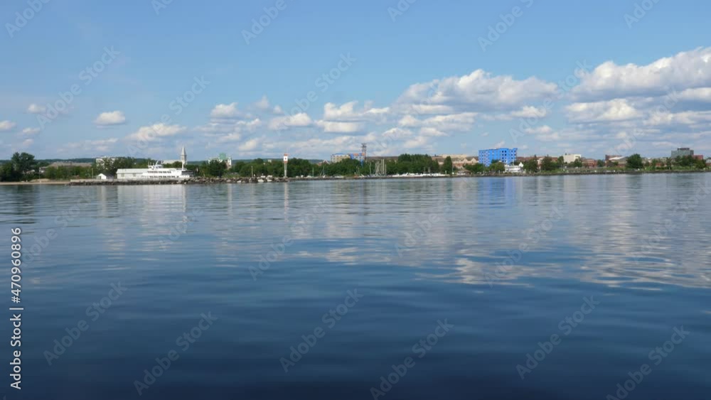 Arriving at the harbour of North Bay on Lake Nippissing, Ontario, Canada. View of the shoreline. Arriving at the harbour of North Bay on Lake Nippissing, Ontario, Canada. View of the shoreline.