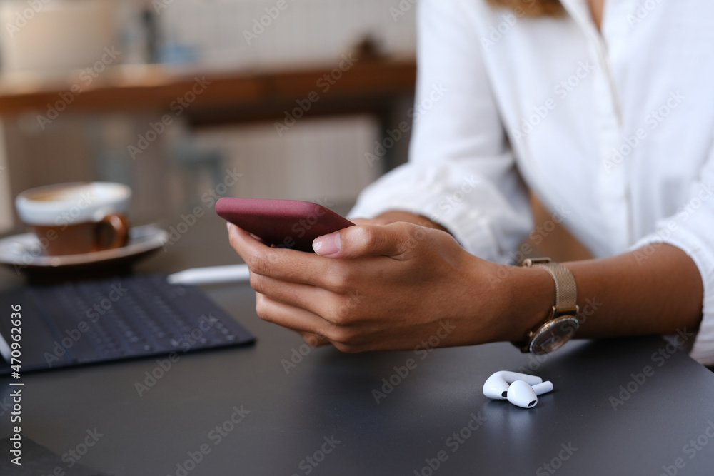 Young woman using a mobile phone Young woman using a mobile phone