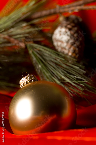 Gold Ornament with pinecone and fir tree