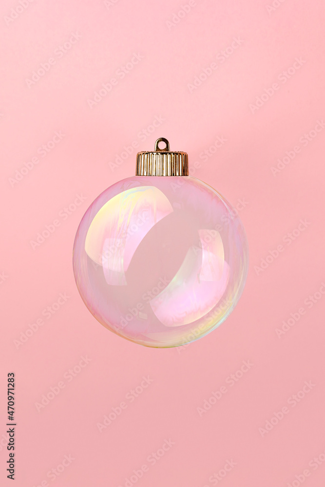 Christmas bauble decoration of soap bubble on pink. New year concept. Christmas bauble decoration of soap bubble on pink. New year concept.