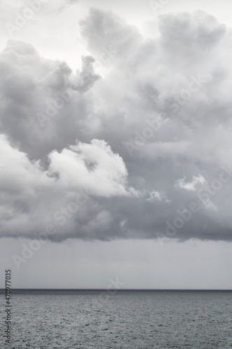 Silver clouds over sea