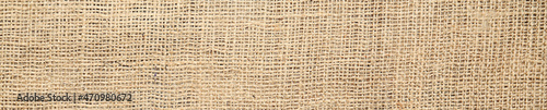 Texture of natural burlap fabric as background, top view. Banner design
