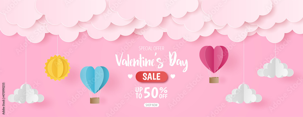Paper cut of Valentine's Day sale background with pink and blue heart hot air balloons, sun and cloud on pink background, banner template Paper cut of Valentine's Day sale background with pink and blue heart hot air balloons, sun and cloud on pink background, banner template
