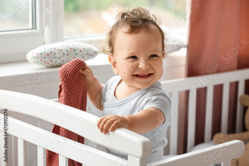 Cute little baby with plaid...