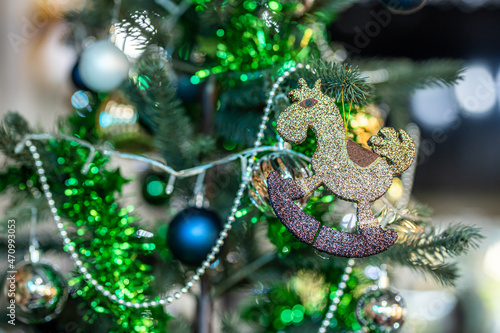 Merry x-mas,Close up of Colorful balls ,gifts box and Christmas greeting picture parcel decoration on Green Christmas tree background Decoration During Christmas and New Year. © Thinapob