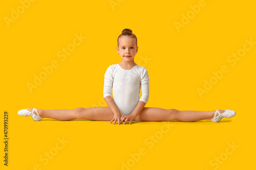 Little girl doing gymnastic...