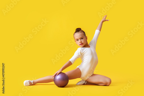 Little girl doing gymnastic...