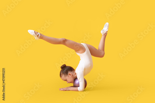 Little girl doing gymnastic...