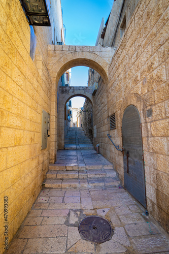 An old and ancient alley paved with stone tiles  in the Jewish Quarter - in the Old City of Jerusalem - Israel