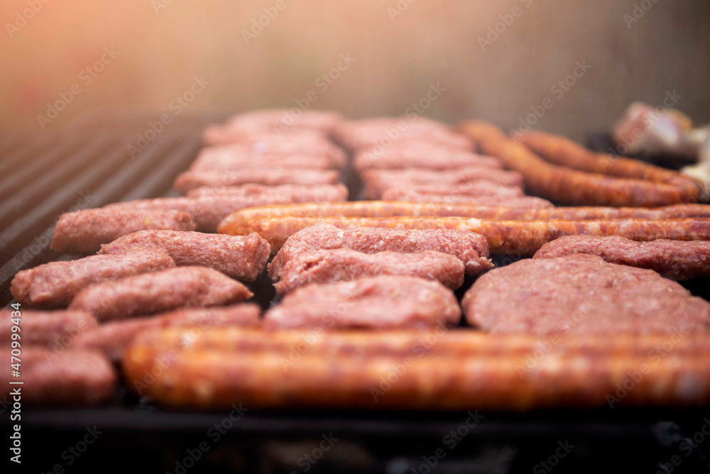 meat on the grill.
sausages and kebabs on grill meat on the grill.
sausages and kebabs on grill