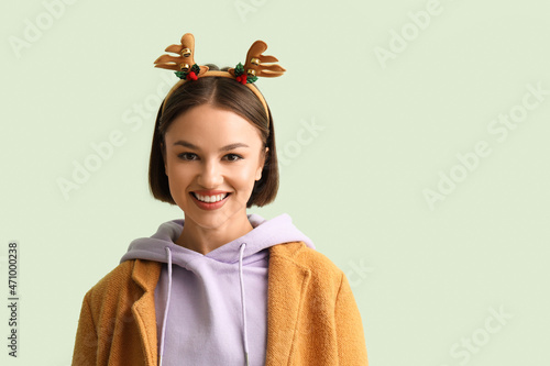 Young woman in stylish wint...