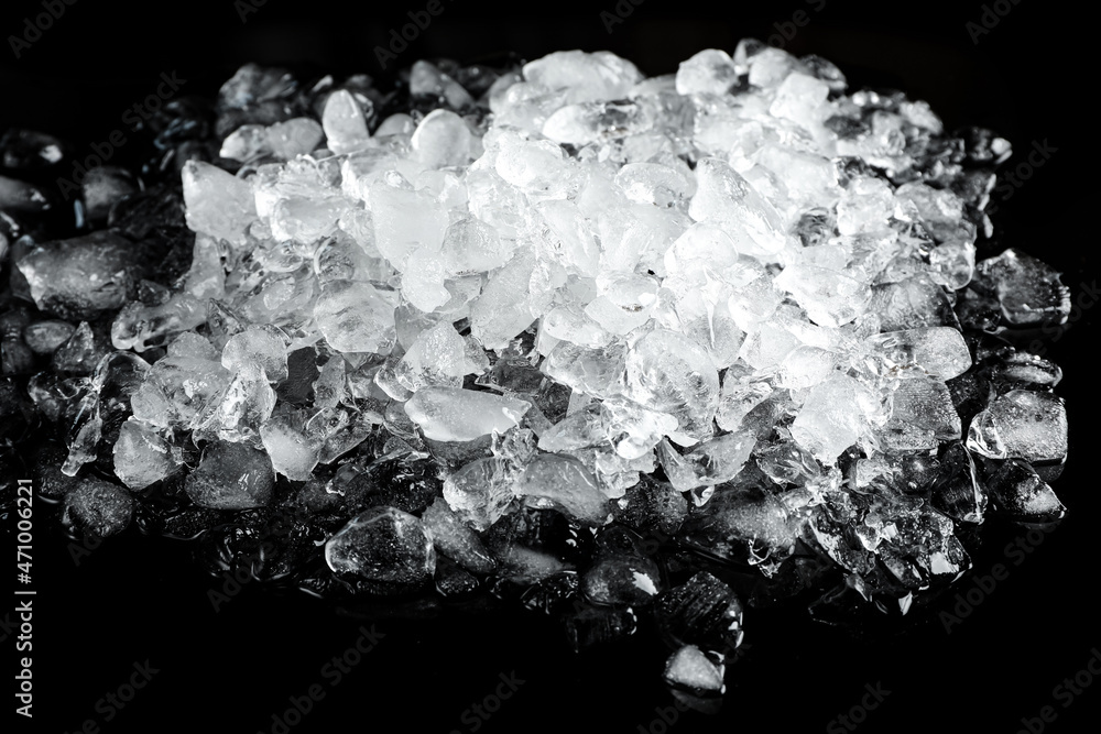 Heap of crushed ice on black table Heap of crushed ice on black table