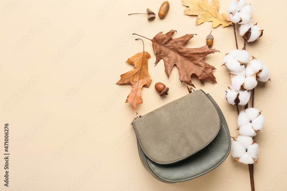 Autumn composition with cotton flowers and bag on beige background - obrazy, fototapety, plakaty 
