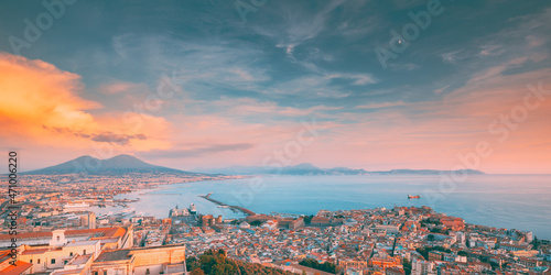 Naples, Italy. Skyline Cityscape City In Evening Sunset. Tyrrhenian Sea And Landscape With Volcano Vesuvius