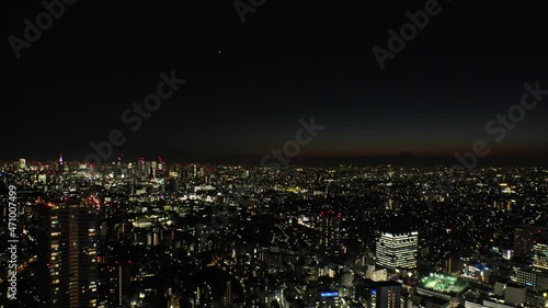 Wallpaper Mural TOKYO, JAPAN : Aerial high angle sunset CITYSCAPE of TOKYO. View of buildings around Shinjuku and Nakano ward. Japanese city life, business and urban metropolis concept. Real time fixed shot. Torontodigital.ca