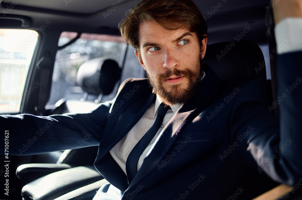 emotional man in a suit in a car a trip to work self confidence