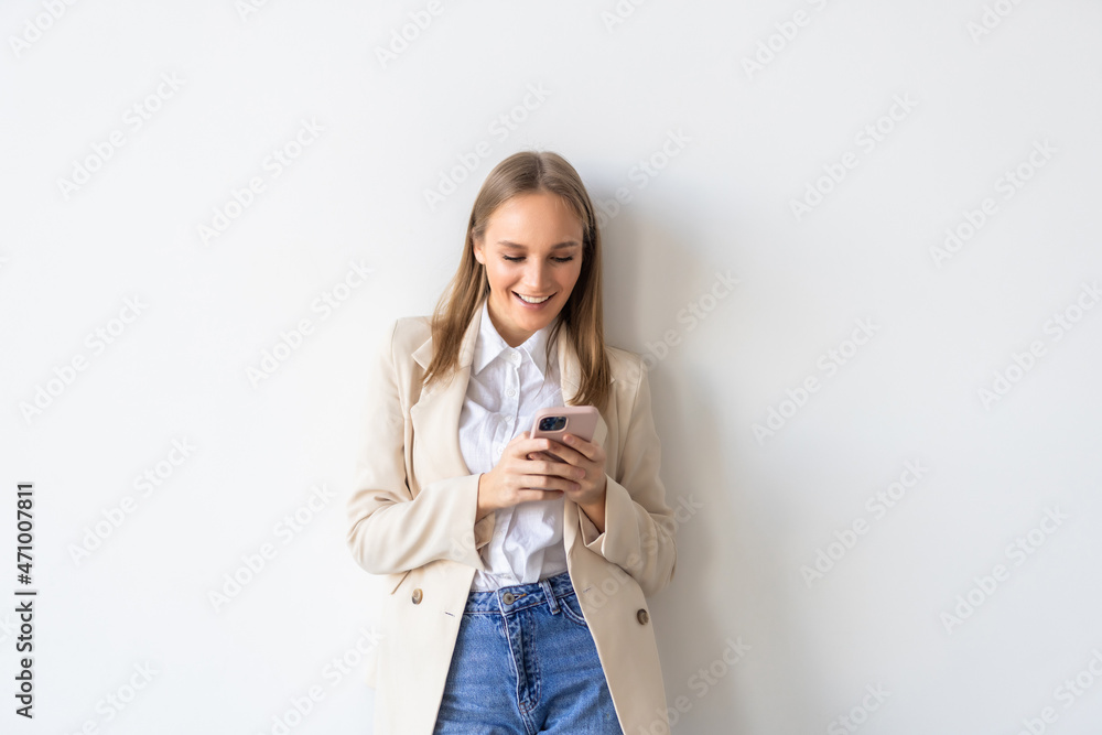 Young businesswoman use phone on white background Young businesswoman use phone on white background