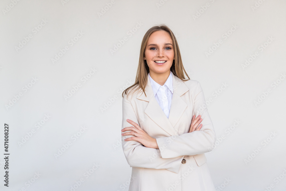 Smiling business woman with crossed arms isolated on white background. Smiling business woman with crossed arms isolated on white background.