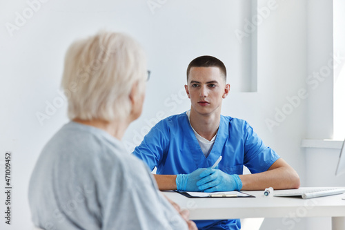 elderly patient talking to the doctor health and medicine