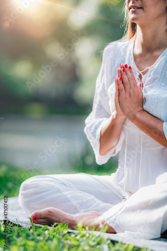 Meditation by the Water, Hands in Prayer Position. photo