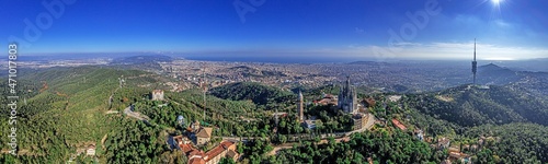 Drone panorama over Catalan metropolis Barcelona taken from Tibidabo direction during the day