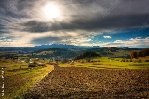 Beautiful landscape of a field in Podhale with a view of the Tatra Mountains. Poland