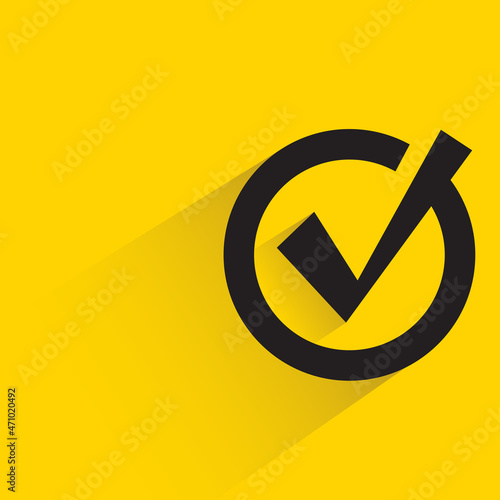 check mark with shadow on yellow background