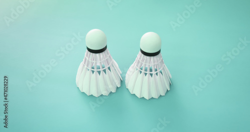 Blurred image background of white shuttlecocks, concept for badminton lovers around the world. © Sophon_Nawit