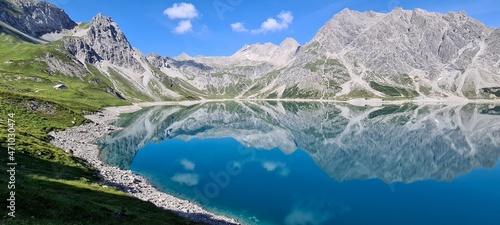Fototapeta Naklejka Na Ścianę i Meble -  Mountains mirroring in Lunersee in the morning, Austrian Alps