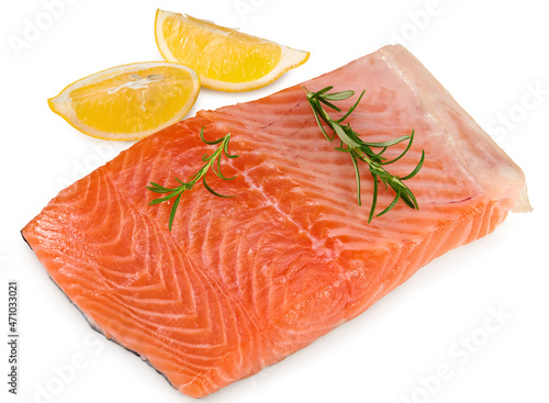 Red fish. Raw salmon fillet with rosemary and lemon isolate on white background. Clipping path and full depth of field. Top view