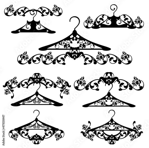 black and white vector design set of elegant calligraphic decorative elements with rose flowers and luxurious vintage coat hangers