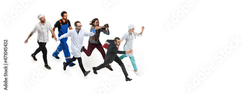 Hurry up. Group of mixed-age men and woman with different professions running isolated on white studio background, Horizontal flyer, collage