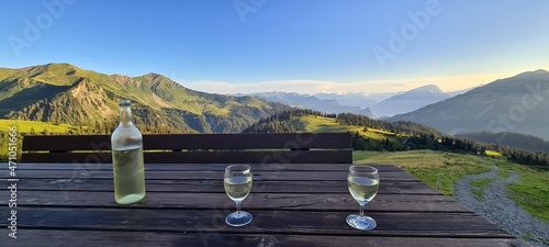 Drinking white wine with a view of Ratikon Alps, Switzerland photo