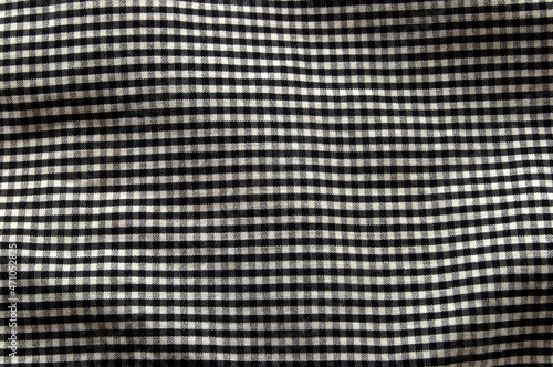 Background of checkered black and white weaving